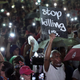 Demonstrators protest outside of the St. Louis city jail following the arrest of 123 people yesterday protesting the acquittal of former St. Louis police officer Jason Stockley on September 18, 2017 in St. Louis, Missouri.